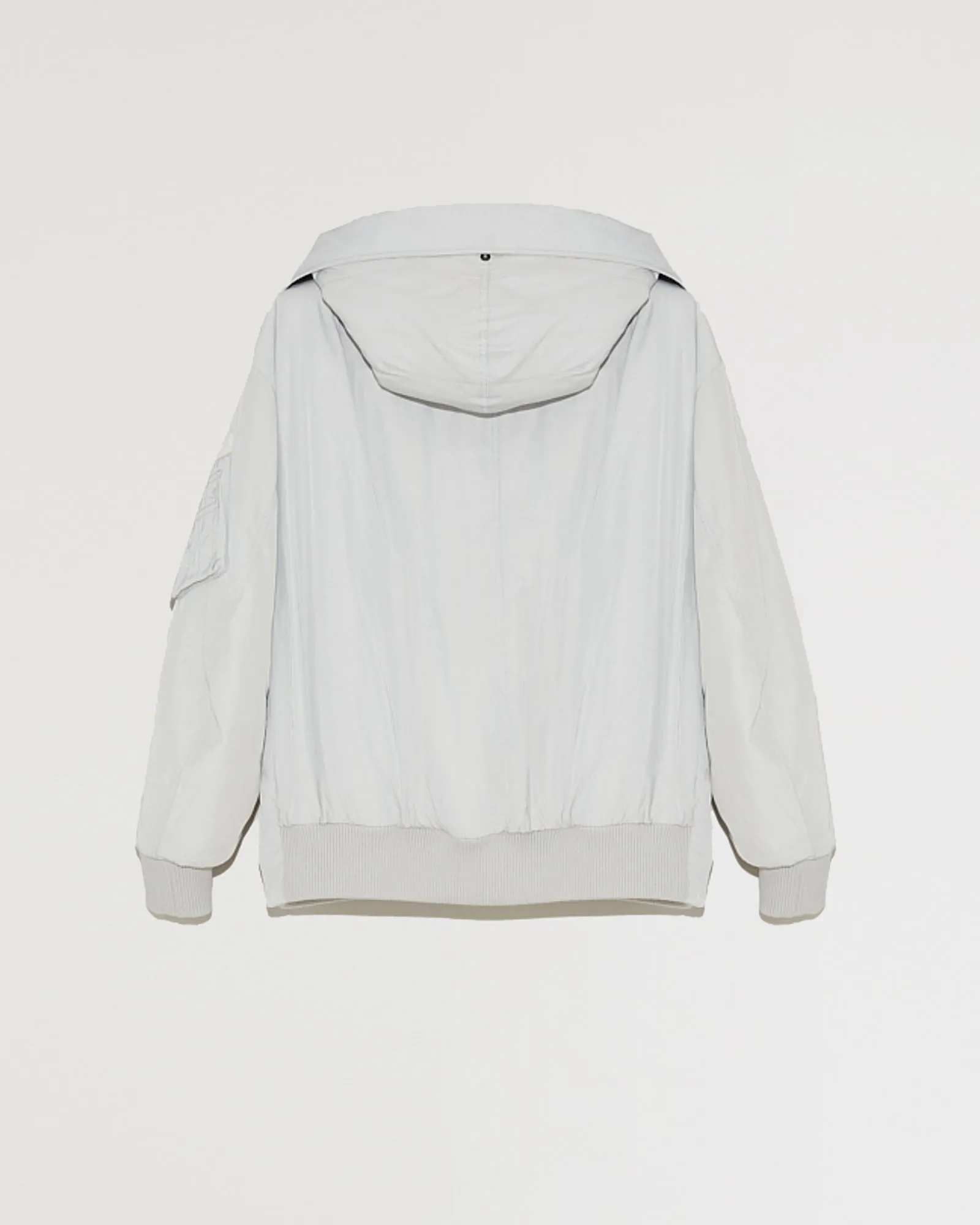 Bomber réversible zippé à capuche en tissu technique et peau lainée