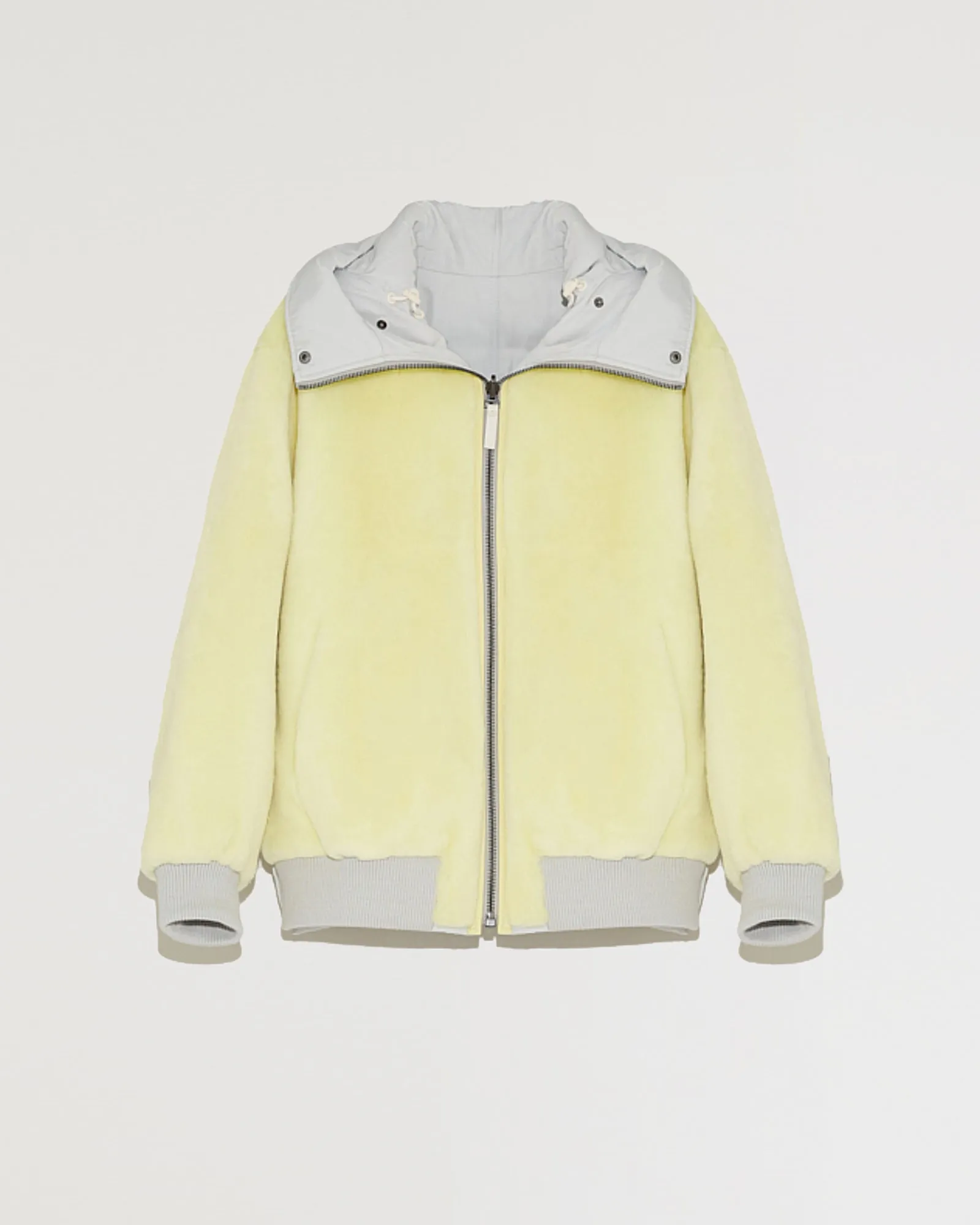 Bomber réversible zippé à capuche en tissu technique et peau lainée