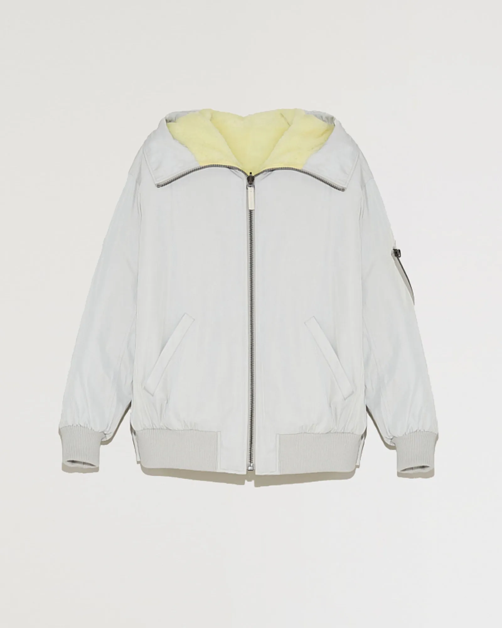 Bomber réversible zippé à capuche en tissu technique et peau lainée