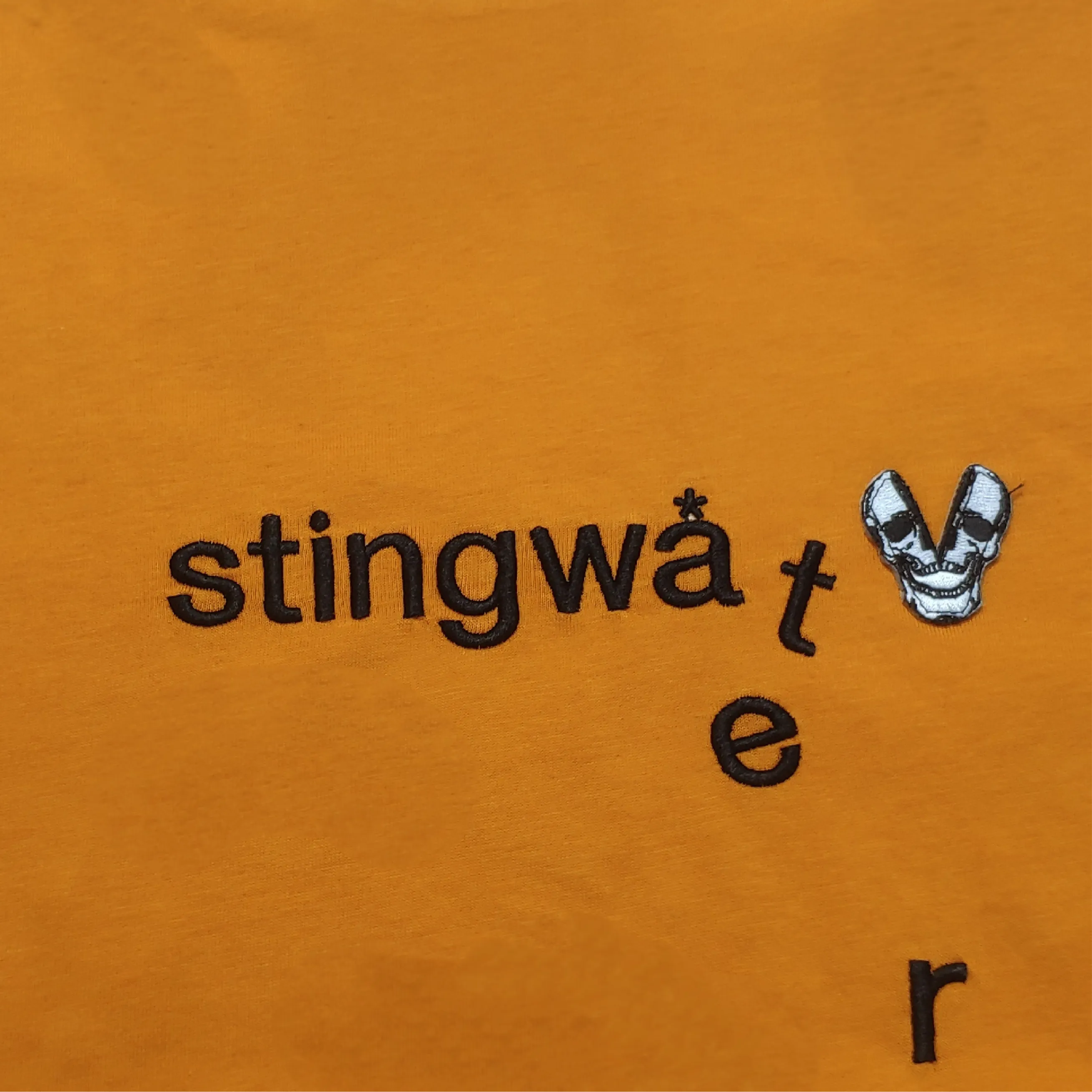 Classic melting logo and skull patch T Shirt Orange