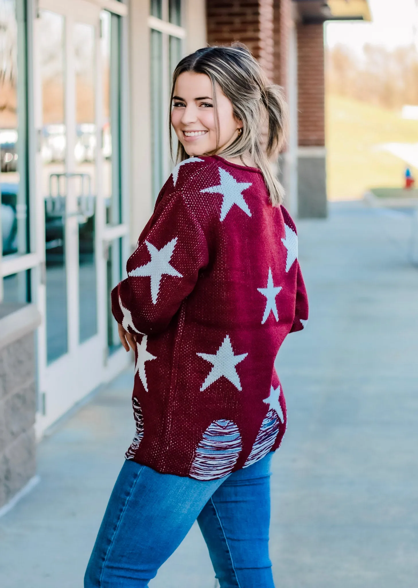 Gonna Be a Super Star Distressed Sweater