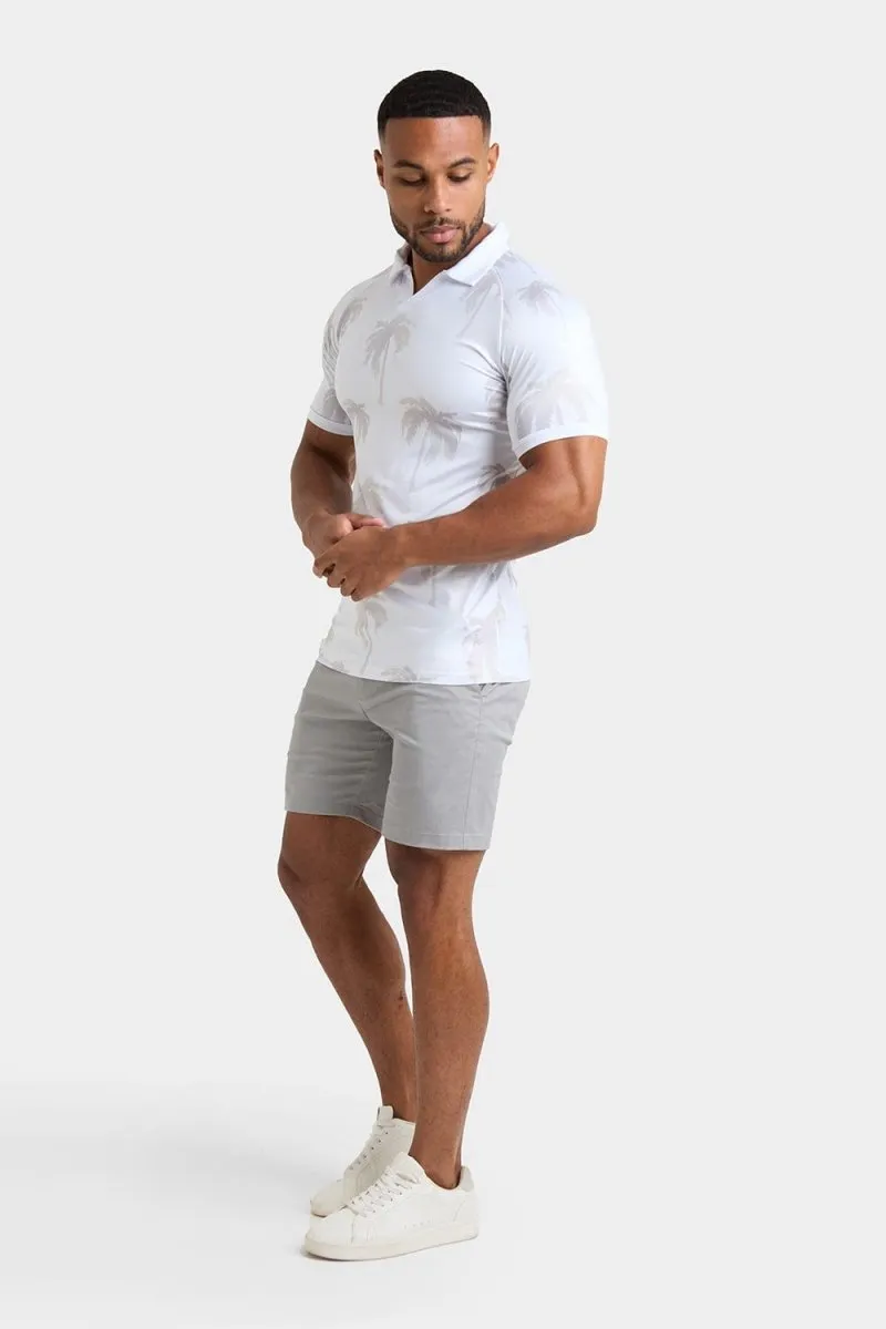 Printed Polo Shirt in White Faded Palms