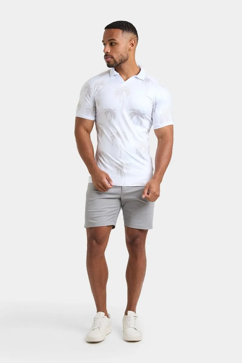 Printed Polo Shirt in White Faded Palms