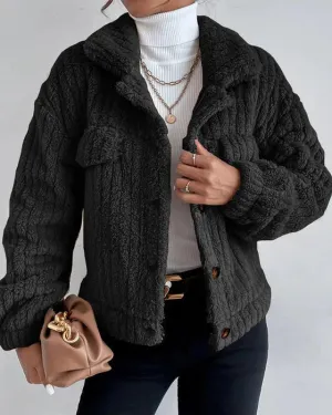 Simple, thick, long-sleeved coat with lapel and buttons.