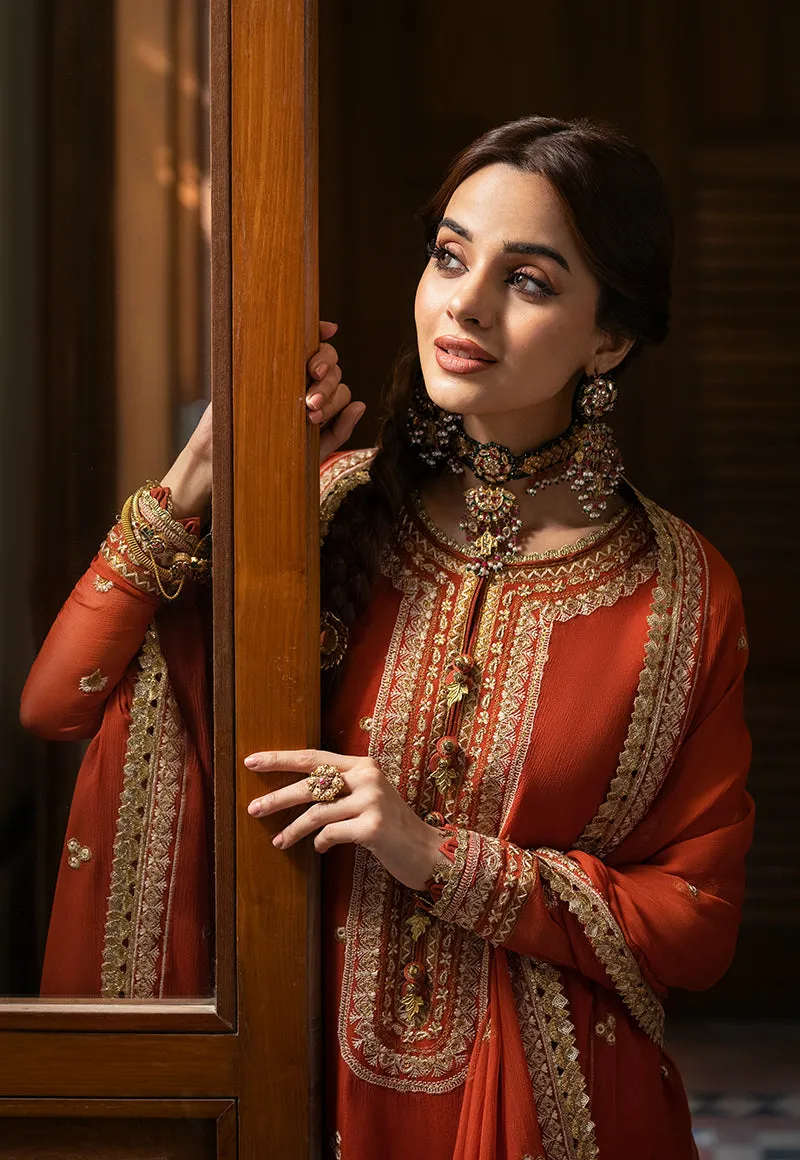 Traditional Pakistani Kameez Salwar Suit in Embroidered Rusty Color
