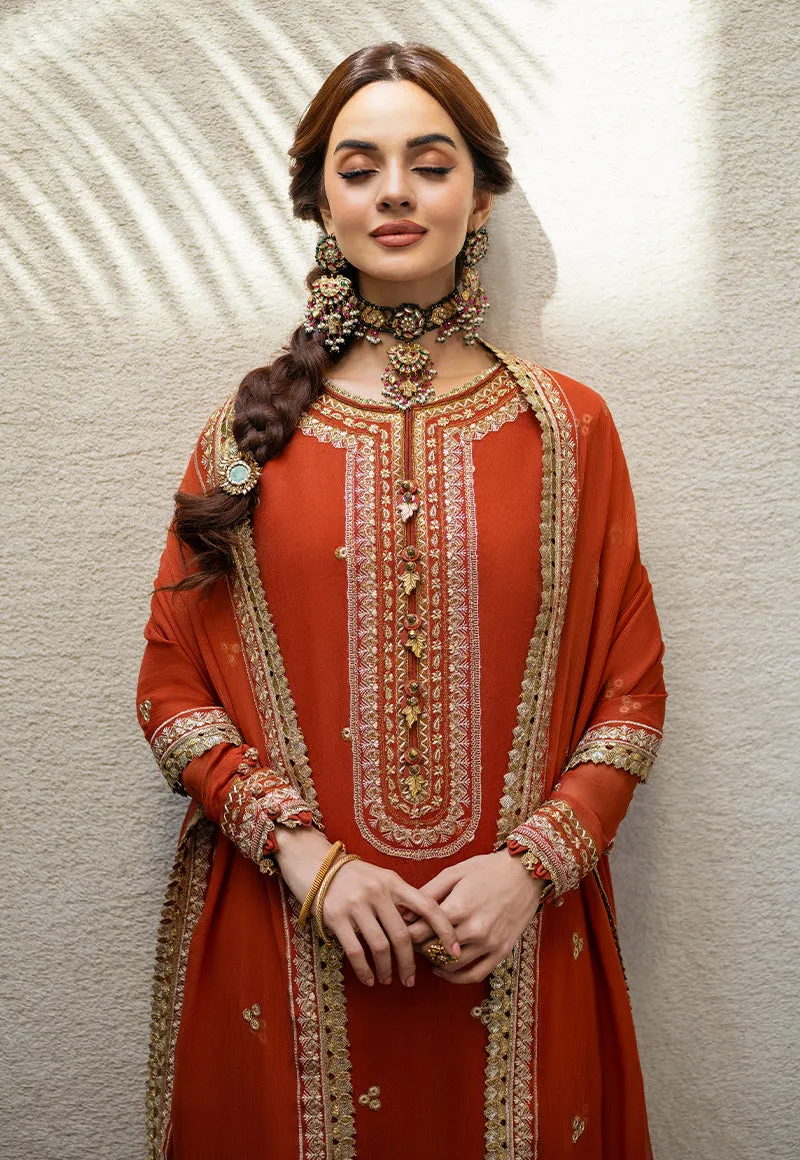 Traditional Pakistani Kameez Salwar Suit in Embroidered Rusty Color